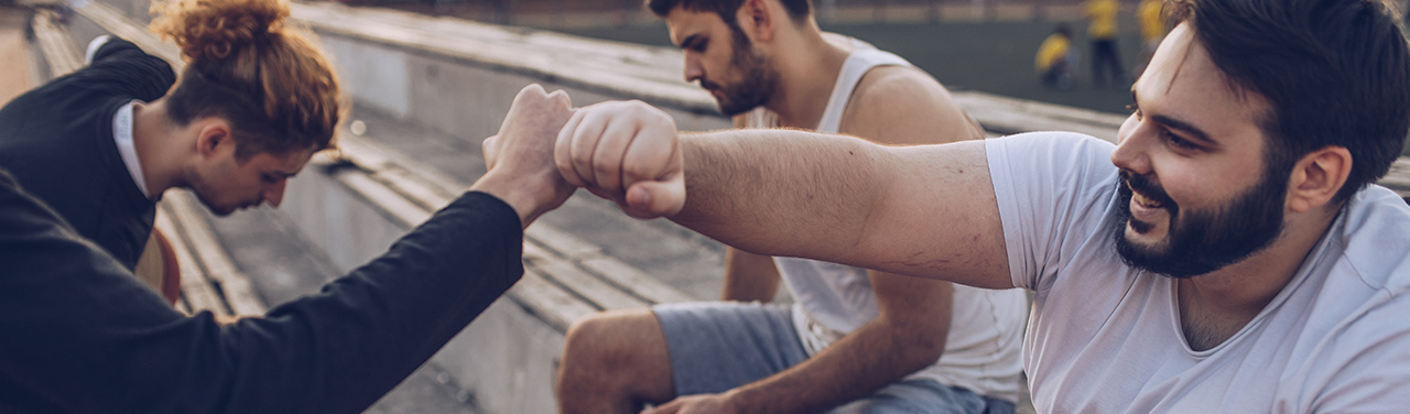 Group_of_friends_fist_bumping